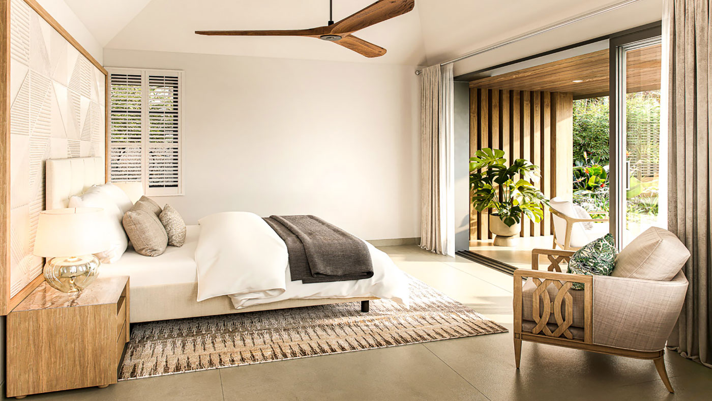 Chambre avec vue lagon et décoration naturelle dans une villa haut de gamme