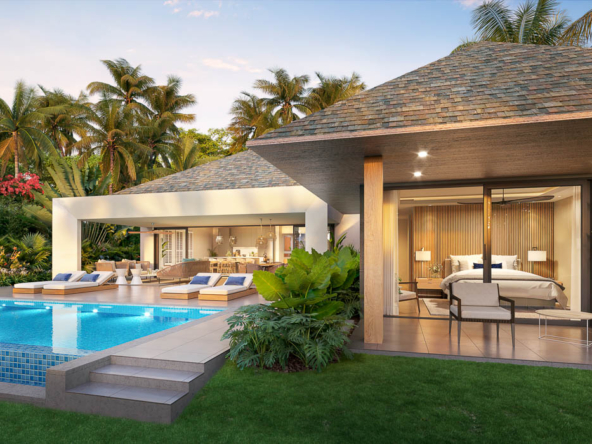Piscine naturelle avec végétation tropicale dans une villa lagon à Mont Choisy