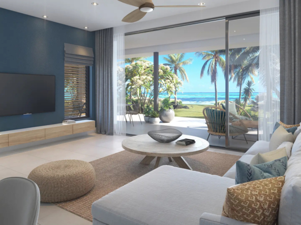 Salon spacieux avec vue sur la terrasse et Le Morne, dans une résidence front de mer haut de gamme à l’île Maurice – Ohana Heritage Group