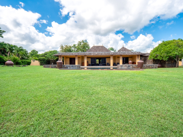 Outdoor lounge area facing Tamarina Golf in Ohana Heritage Group villa