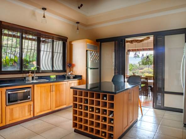 Luxury villa with private pool and lush tropical garden in Tamarina Golf Estate
