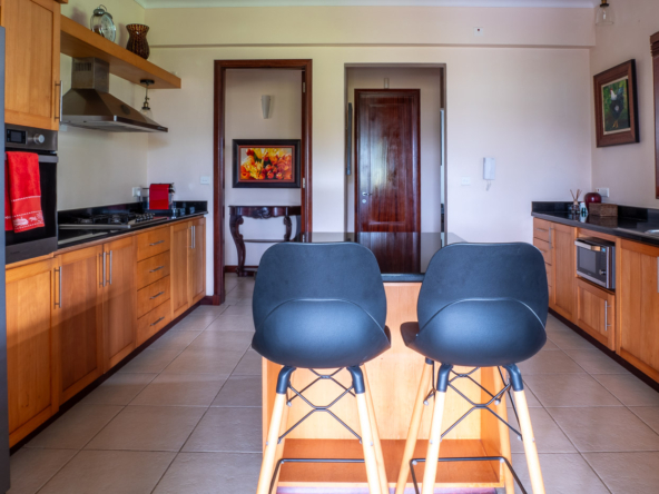 Luxury villa with private pool and lush tropical garden in Tamarina Golf Estate