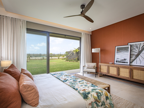 Suite élégante avec vue jardin et lagon dans une villa à Anahita