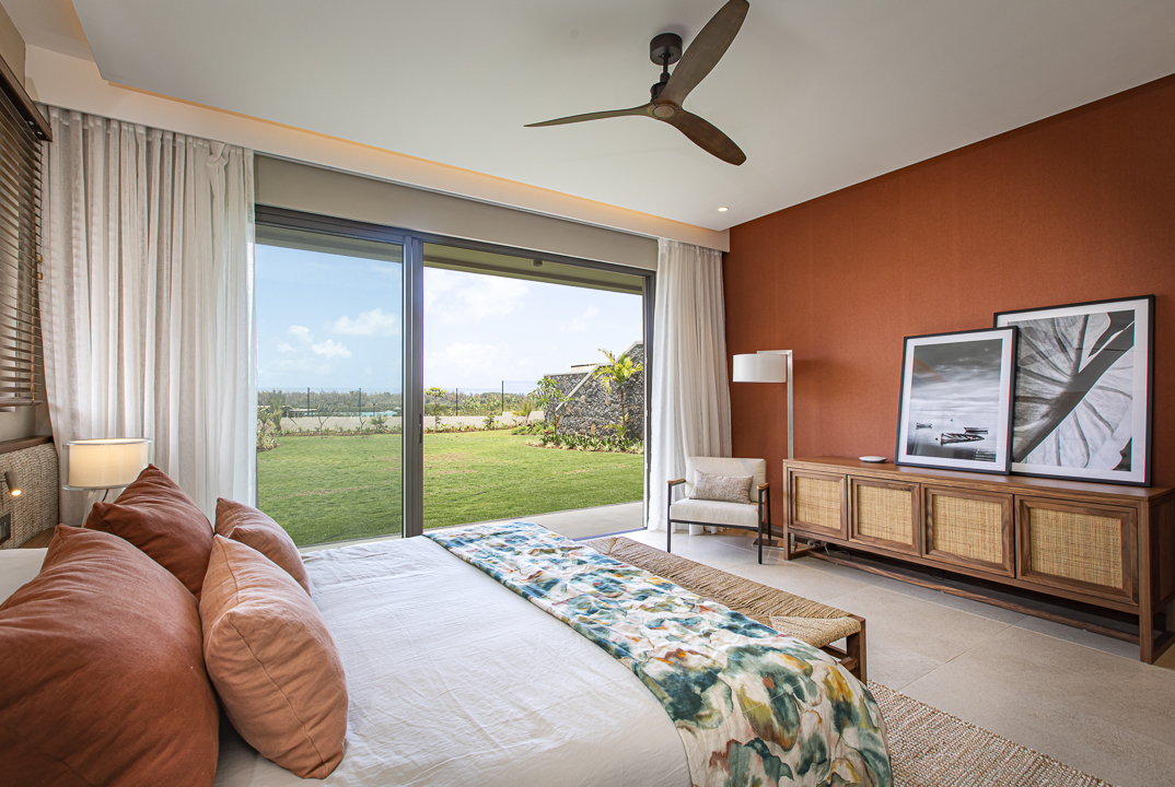 Suite élégante avec vue jardin et lagon dans une villa à Anahita
