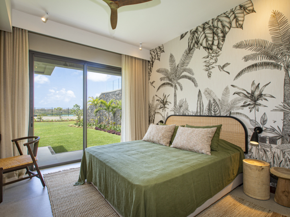 Suite élégante avec vue jardin et lagon dans une villa à Anahita