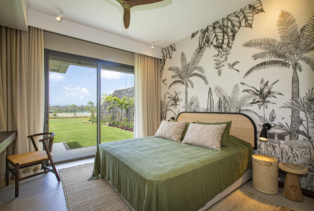 Suite élégante avec vue jardin et lagon dans une villa à Anahita