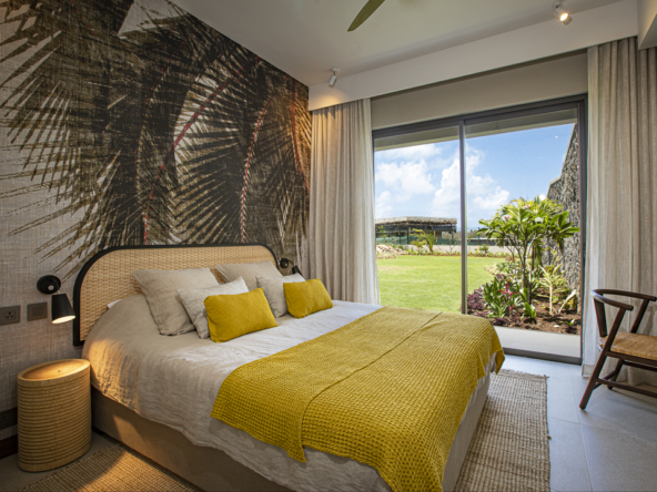 Suite élégante avec vue jardin et lagon dans une villa à Anahita