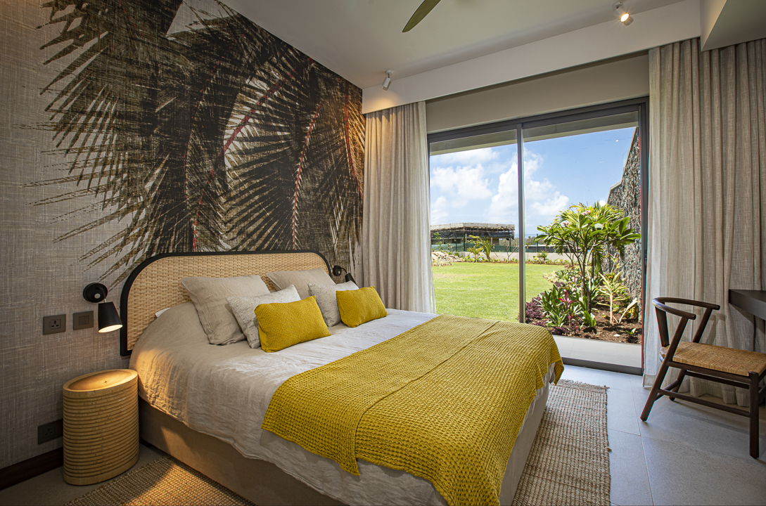 Suite élégante avec vue jardin et lagon dans une villa à Anahita